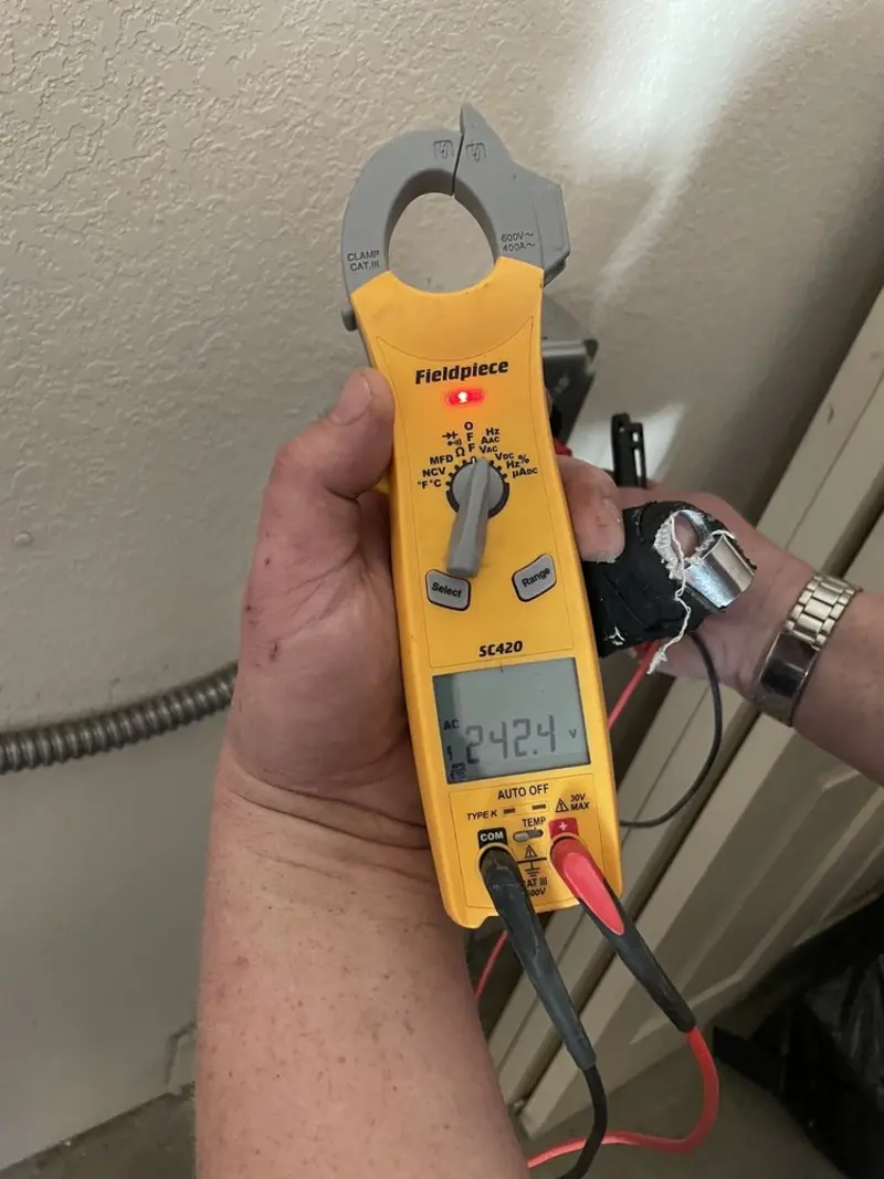 Voltage testing with clamp meter during Generator Installation in South Venice